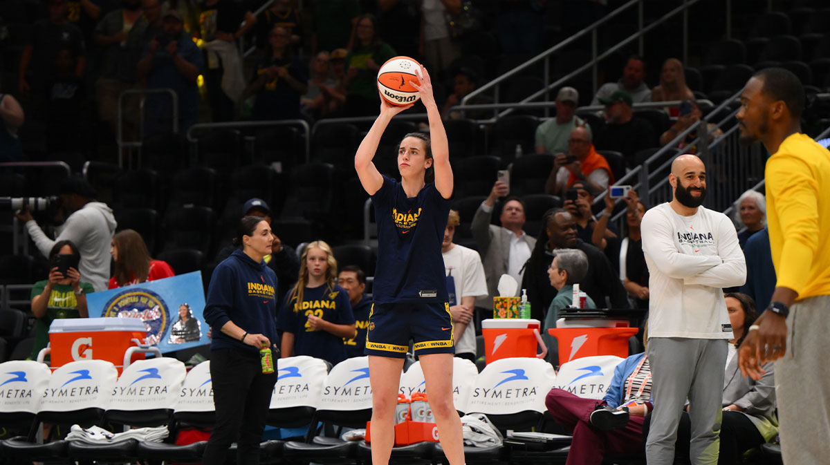 Indiana Fever guard Caitlin Clark (22) shoots the ball during warmups before the game against the Seattle Storm at Climate Pledge Arena.