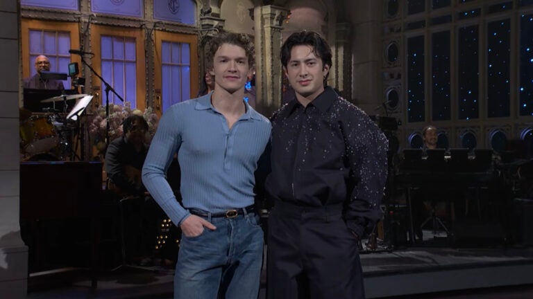 SNL recap: Host Connor Storrie (left) and "Heated Rivalry" costar Hudson Williams introduce musical guest Mumford & Sons on the Feb. 28, 2026 episode of "Saturday Night Live."