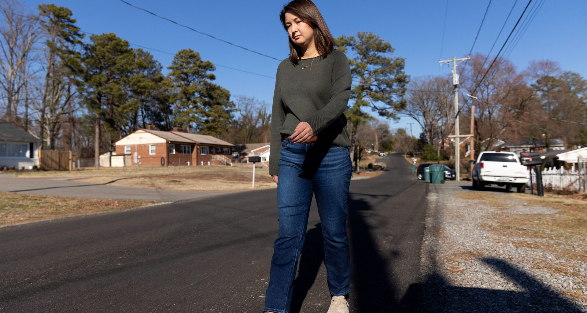 Sheldon Ekirch walks along a street in her neighborhood.