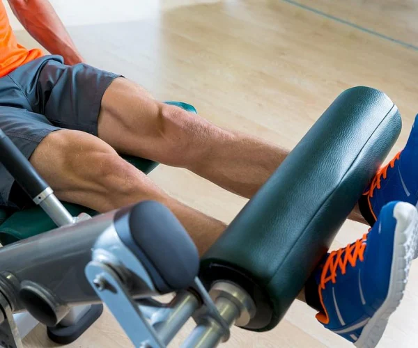 man in gym on exercise equipment
