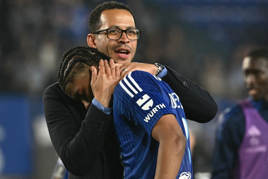 Strasbourg manager Liam Rosenior embracing Andrey Santos
