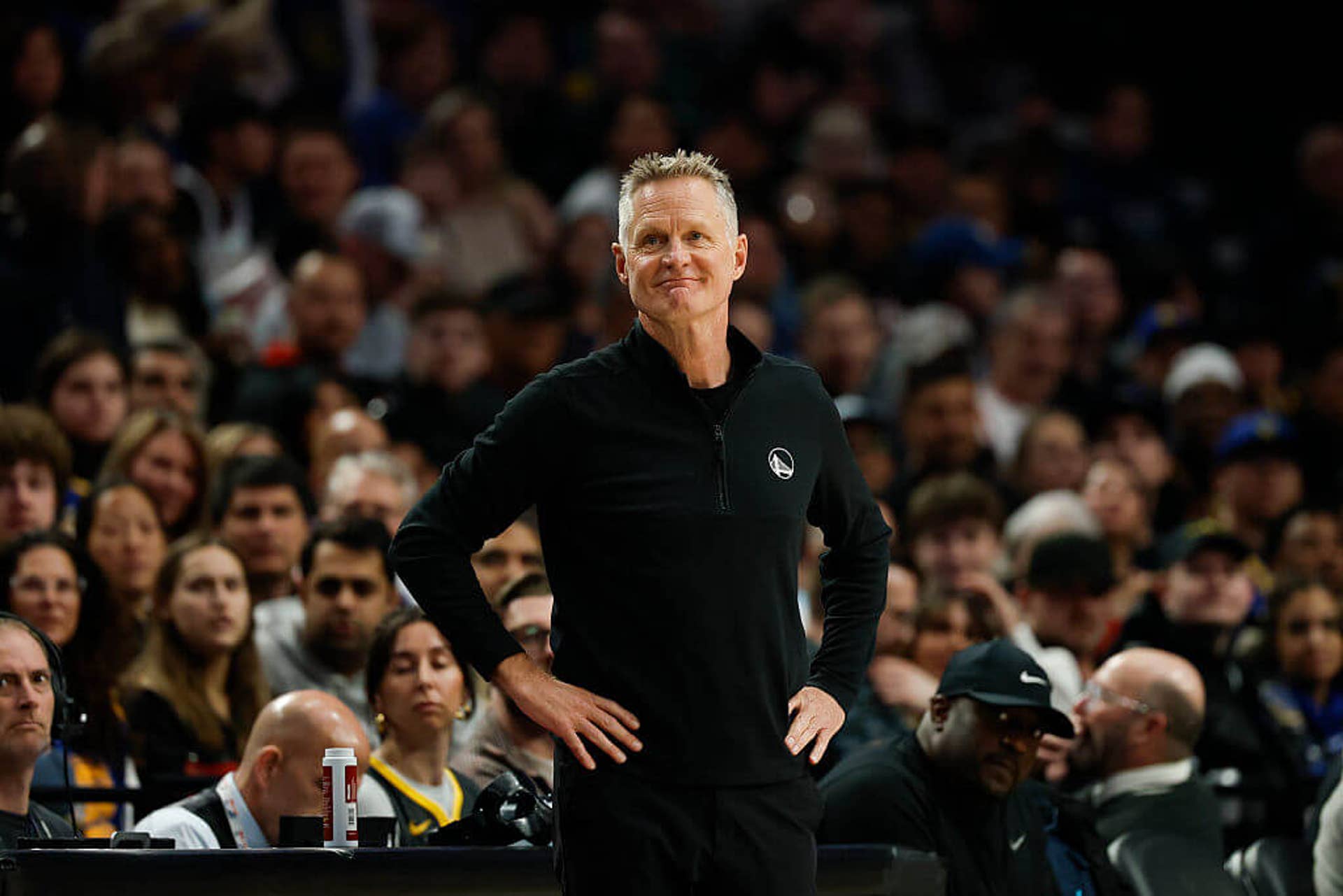 Steve Kerr smiles during a Warriors game.