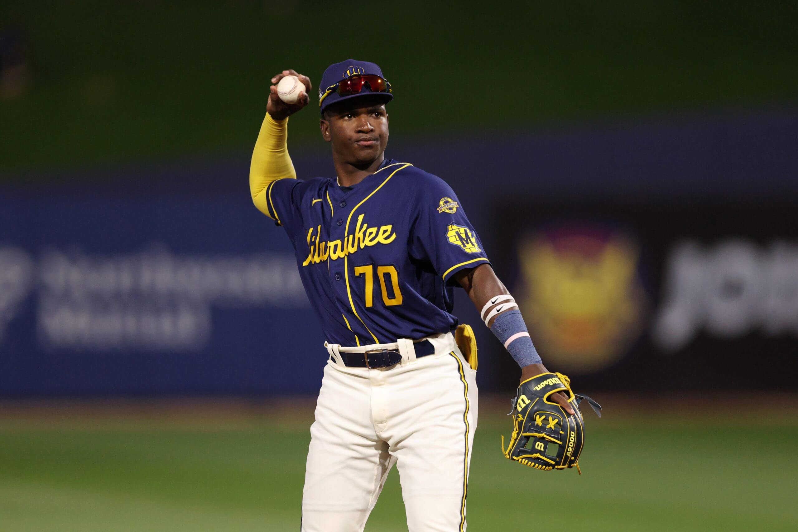 Luis Peña #70 of the Milwaukee Brewers throws during the game between the Cincinnati Reds and the Milwaukee Brewers at American Family Fields of Phoenix on Sunday, March 16, 2025 in Phoenix, Arizona. 