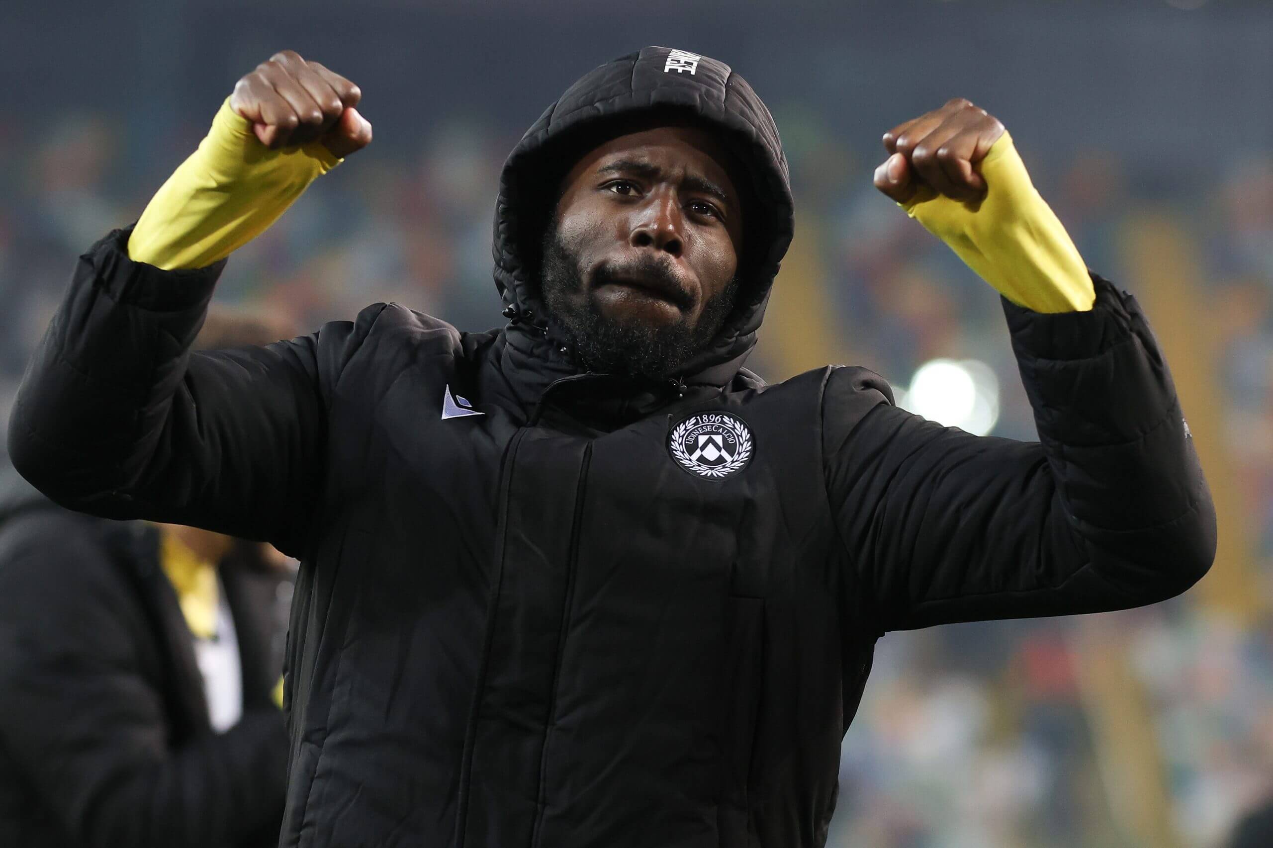 Keinan Davis, fists clenched in celebration, gestures to the crowd at Fiorentina