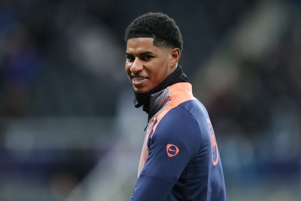 Marcus Rashford smiles during warm up