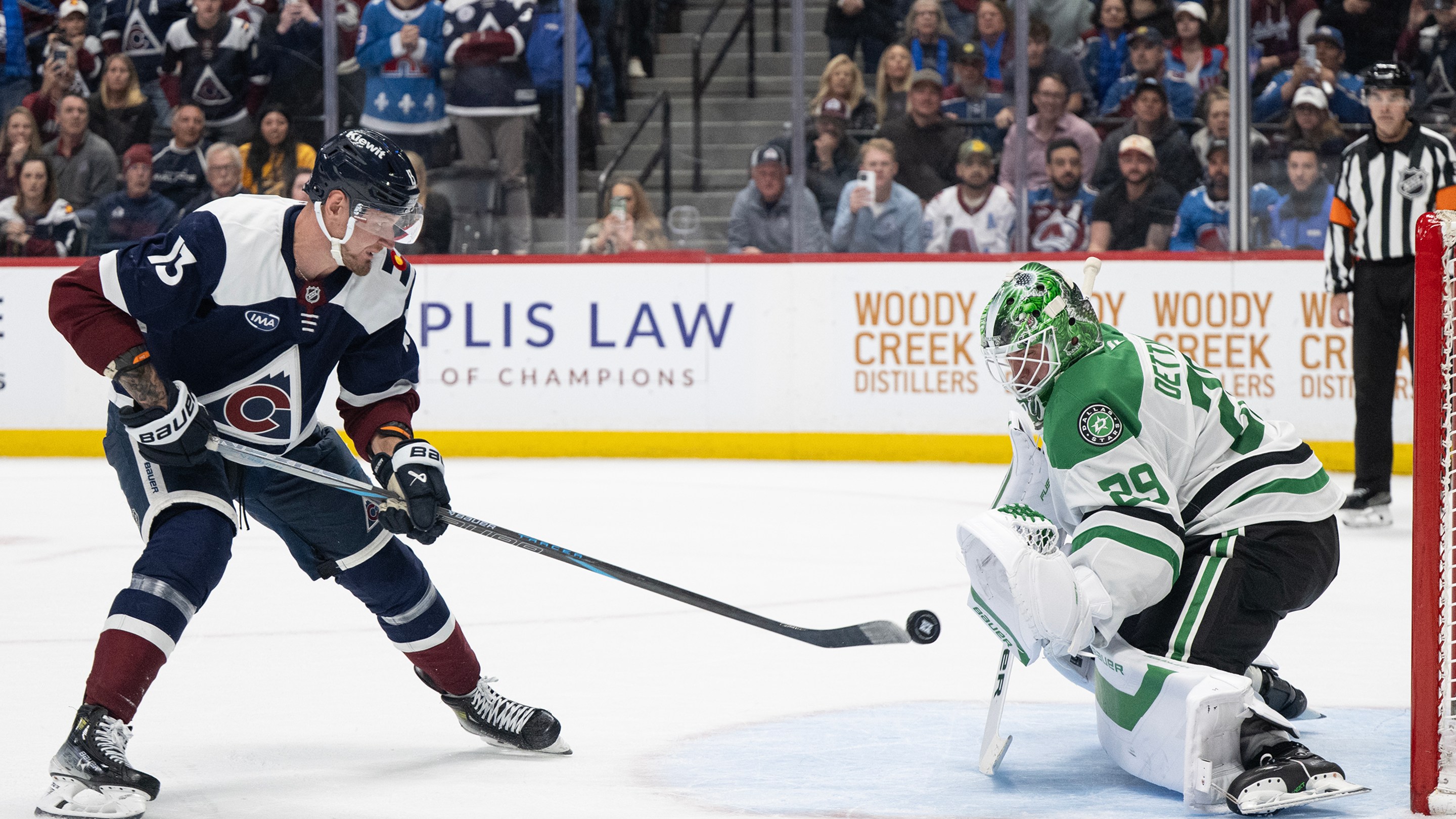 Goaltender Jake Oettinger (29) of the Dallas Stars saves a shot bu right wing Valeri Nichushkin