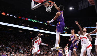 Ryan Dunn #0 of the Phoenix Suns dunks the ball during the first half against the Toronto Raptors a...