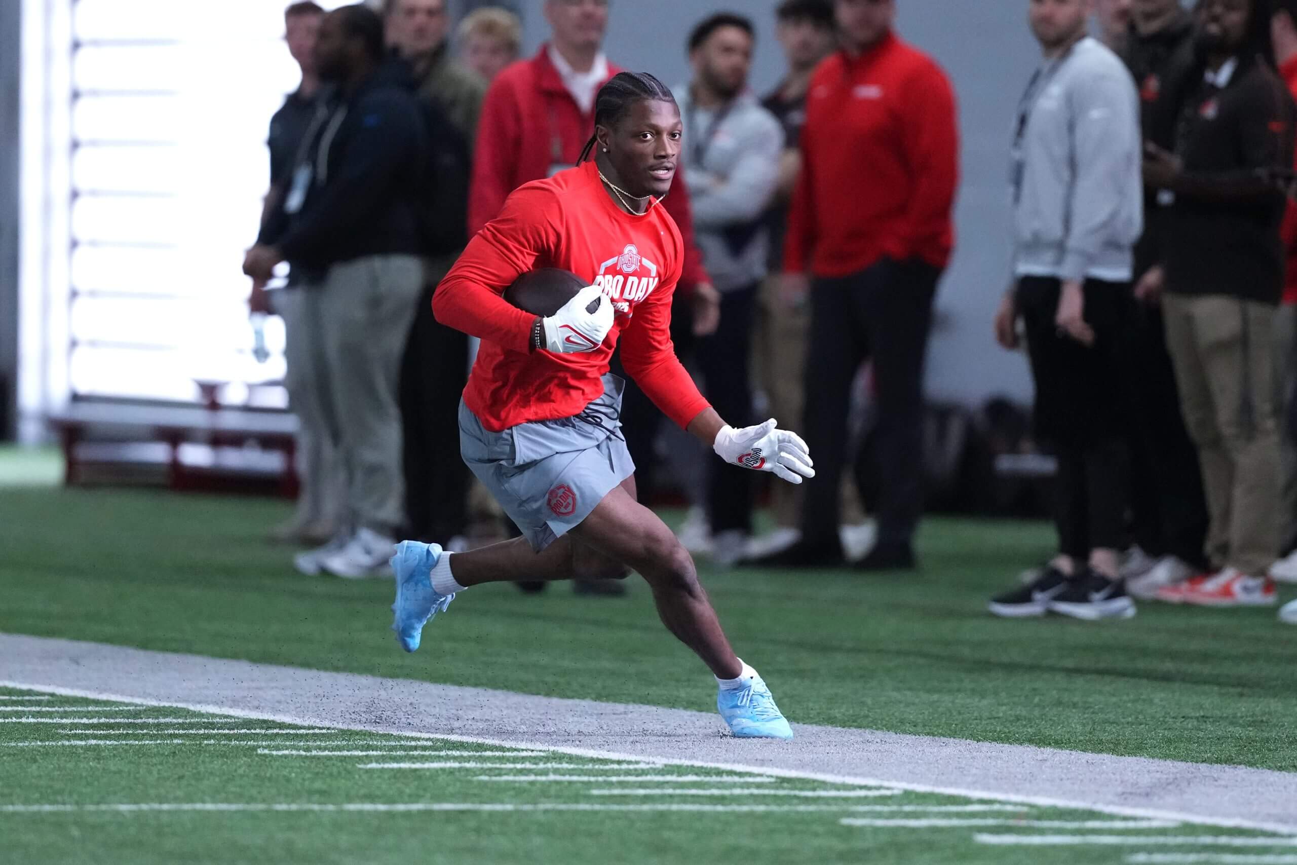 Receiver Carnell Tate participates in drills during a pro day at Ohio State.