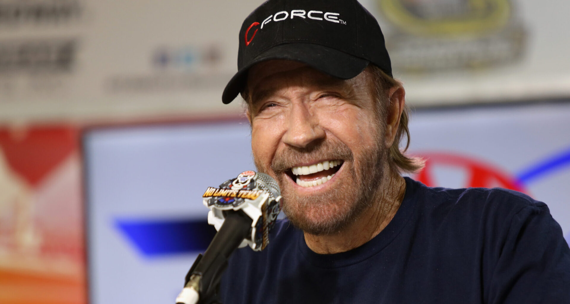 Actor Chuck Norris speaks with the media during a press conference prior to the NASCAR Sprint Cup S...