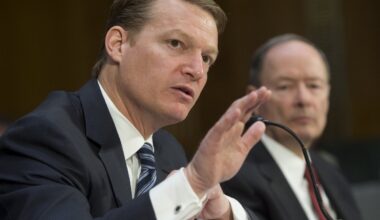 FireEye's chief executive testifying in Congress next to the former NSA director.