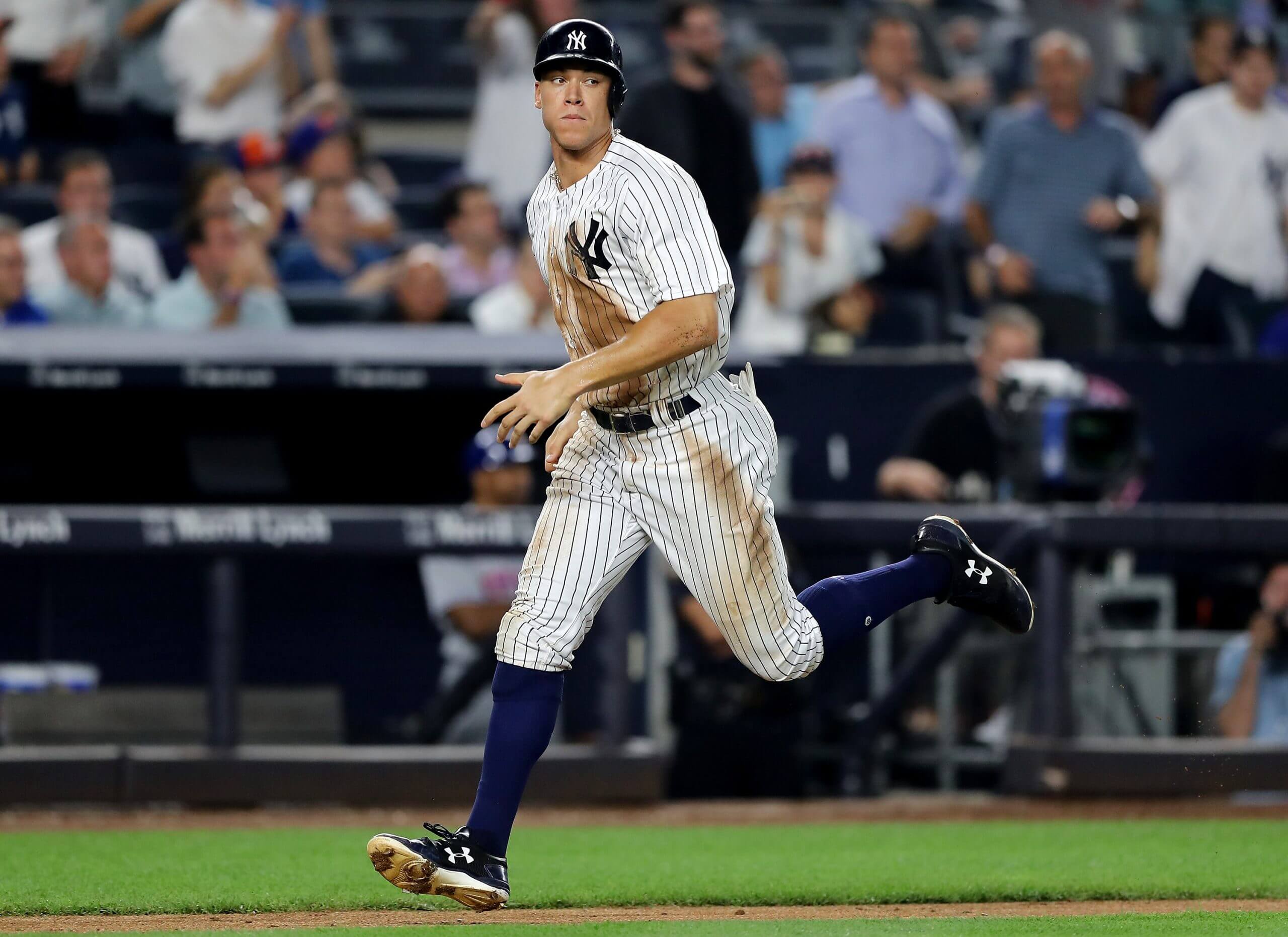 Aaron Judge scores a run on a sacrifice fly in 2017.