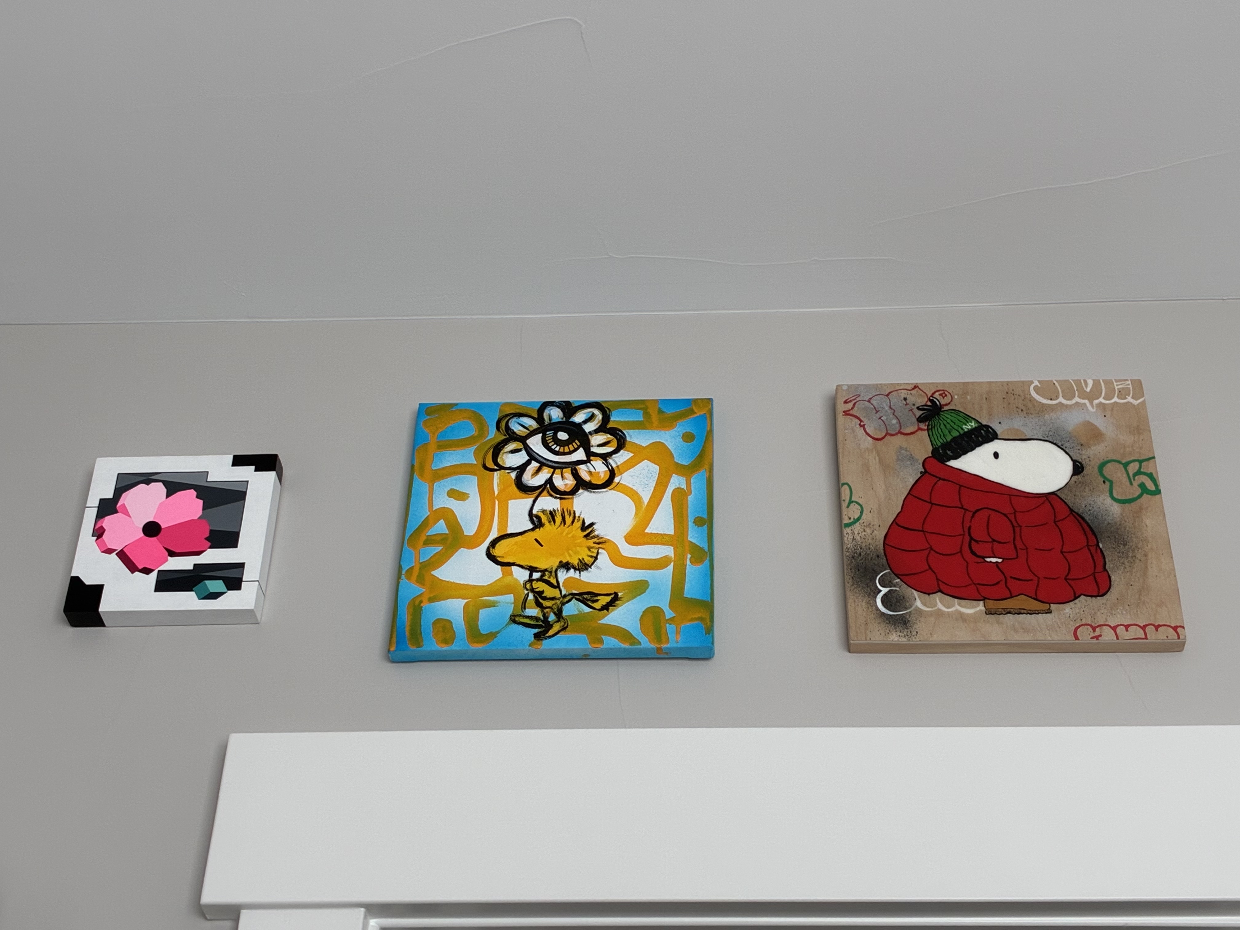 Art hanging over a door frame