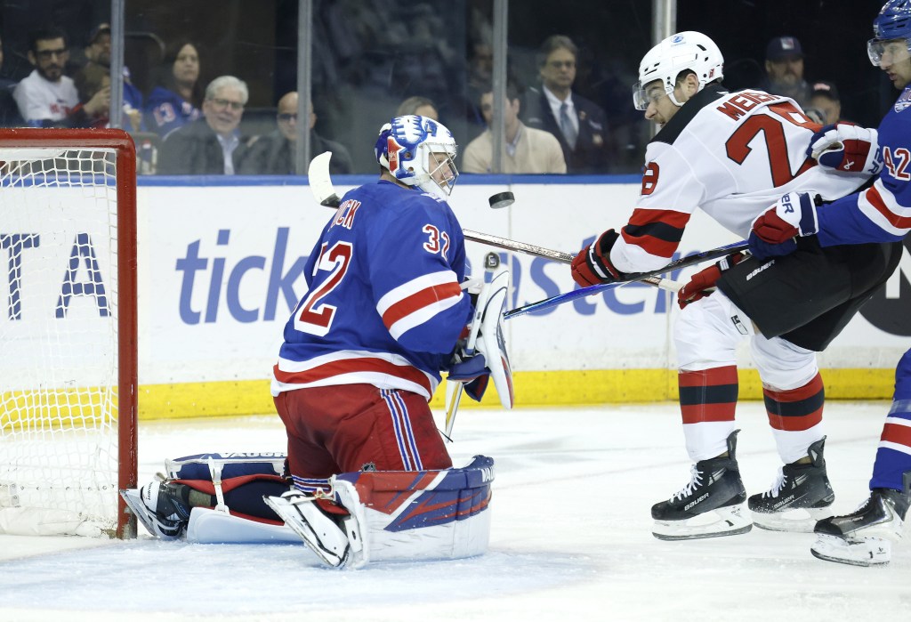 Jonathan Quick makes a save on Timo Meier during the second period of the Rangers' loss to the Devils at the Garden.