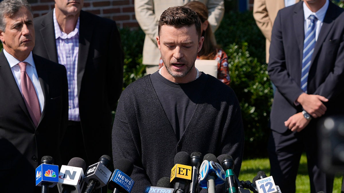 Justin Timberlake speaks to the press after a court hearing