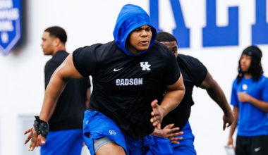 Feb 24, 2026; Columbia, South Carolina, USA; Kentucky Wildcats guard Otega Oweh (00) drives around South Carolina Gamecocks guard Meechie Johnson (5) during the second half at Colonial Life Arena. Mandatory Credit: Jeff Blake-Imagn