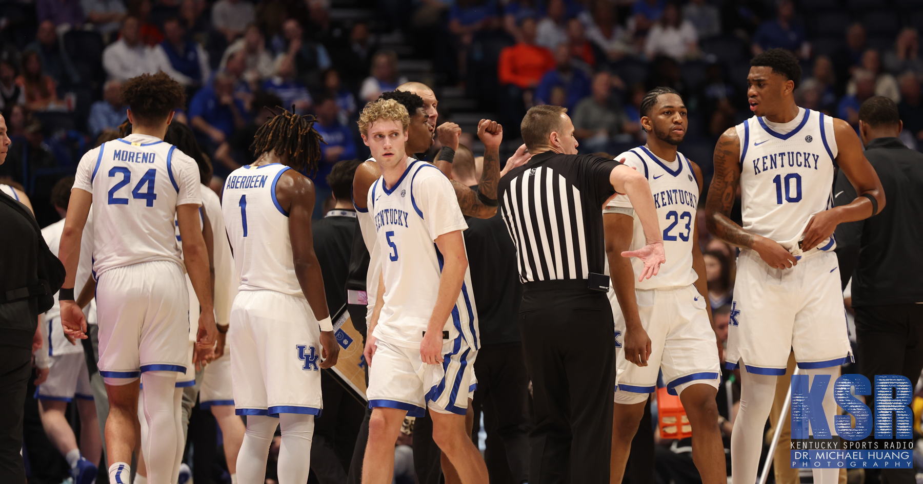 Vanderbilt quarterback Diego Pavia (2) is brought down from behind by Kentucky defensive lineman Mi'Quise Humphrey-Grace (90) during the second quarter at FirstBank Stadium in Nashville, Tenn., Saturday, Nov. 22, 2025. (© Mark Zaleski / The Tennessean / USA TODAY NETWORK via Imagn Images)