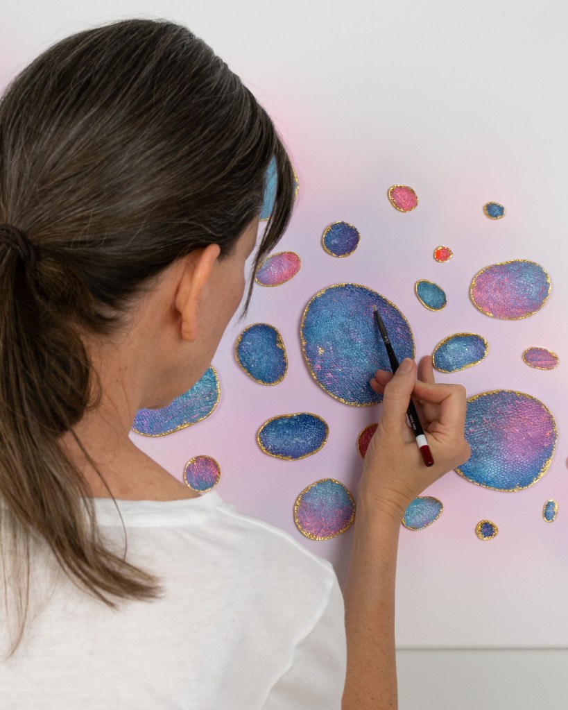 Artist Laura Shape painting.