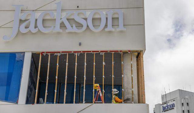 Construction crews work on the exterior of Jackson Memorial Hospital's new emergency department on Thursday, March 5, 2026, in Miami, Fla. The new facility doubles the size of their current emergency room and is expected to reduce patient wait times.