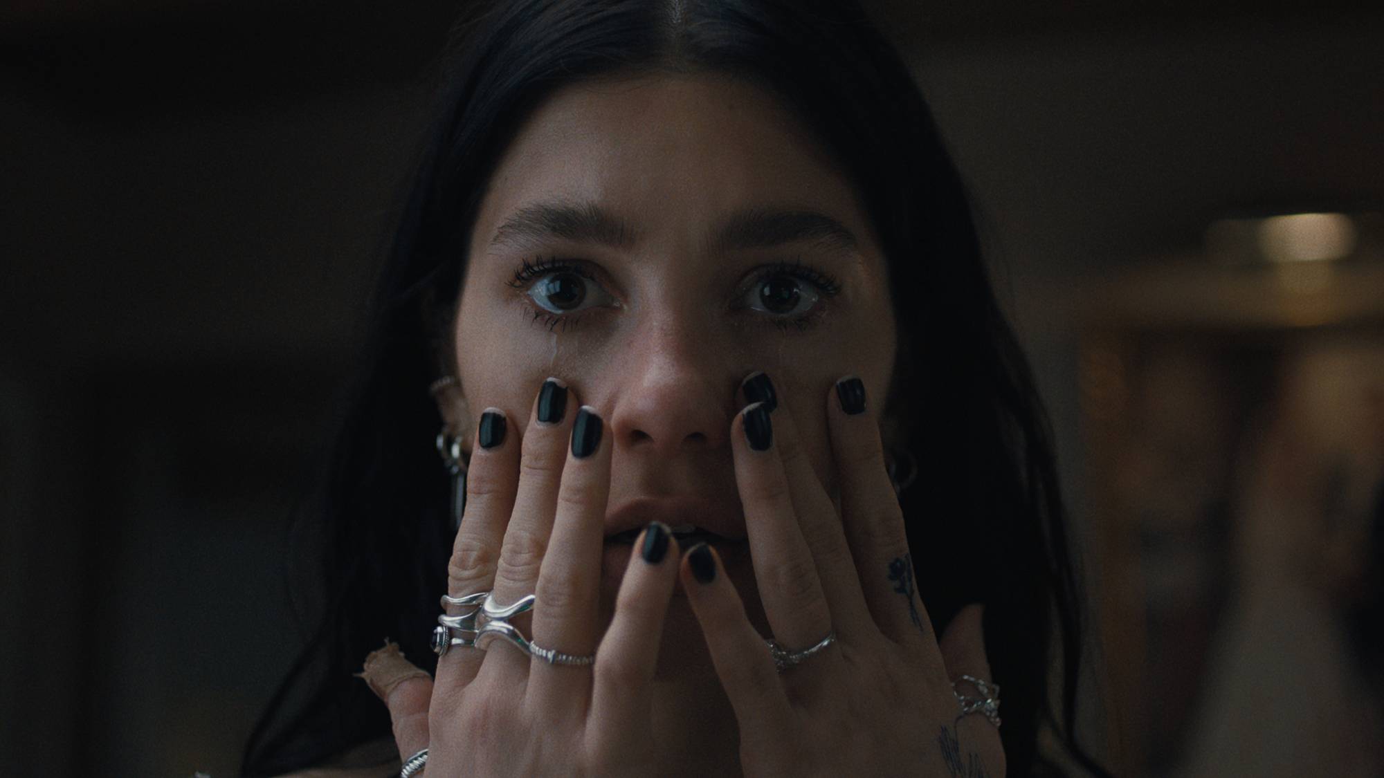 Camila Morrone as Rachel Harkin in "Something Very Bad Is Going to Happen"