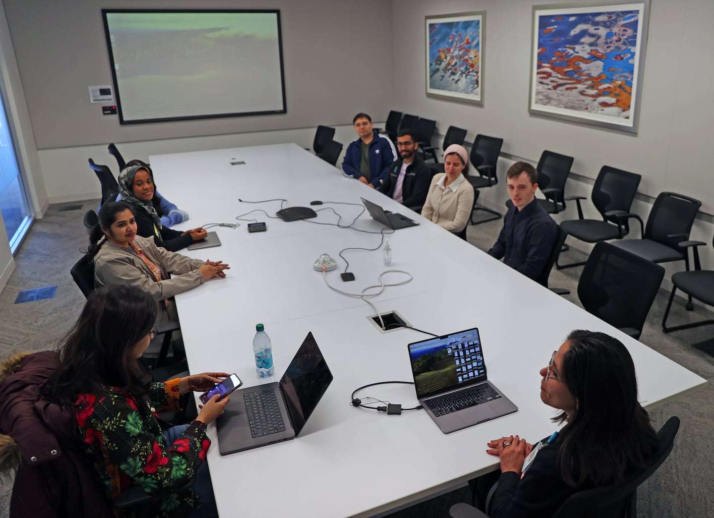 Dr. Lidia Moura, lower right, conducted a meeting.