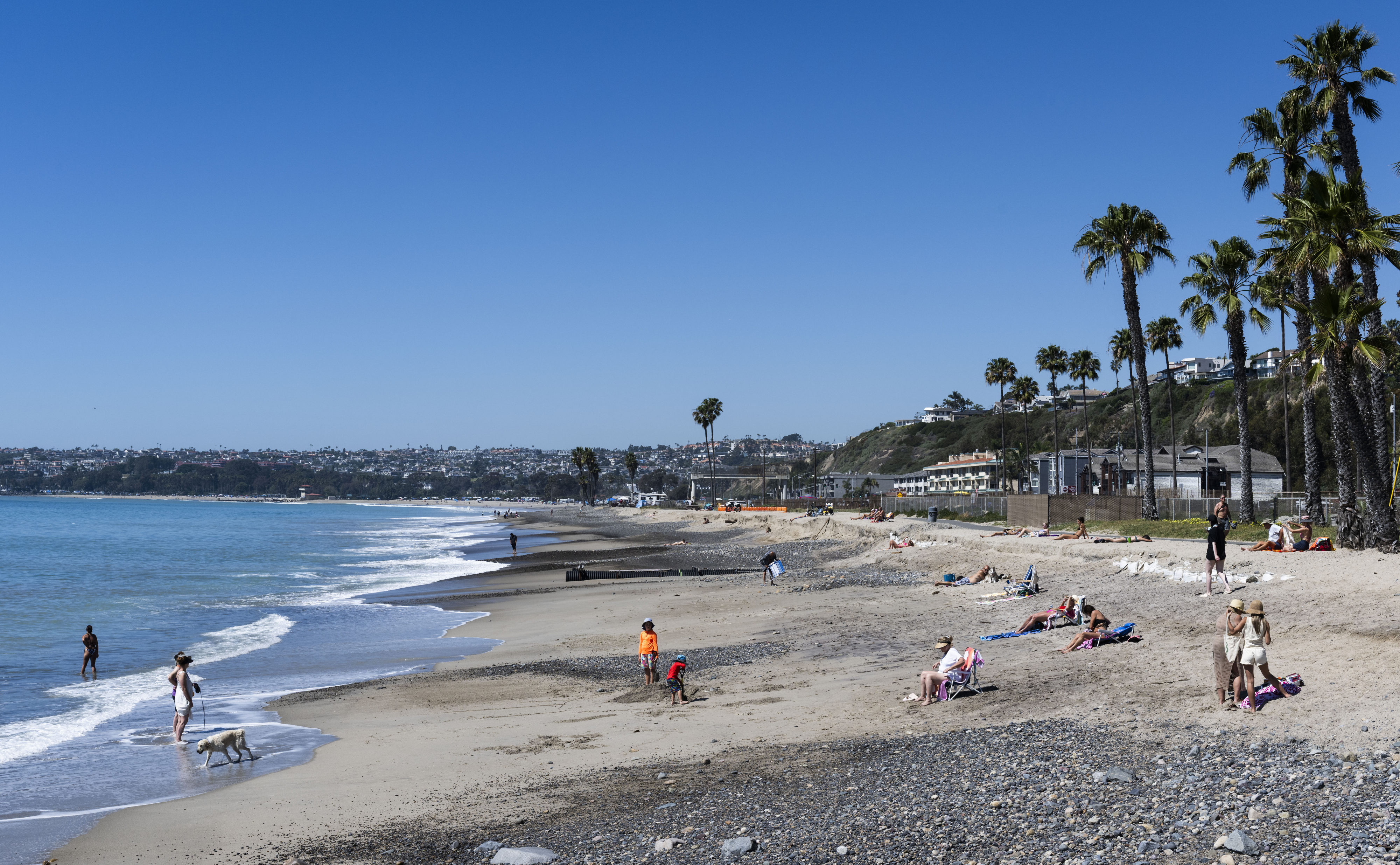 Poeple use the beach at Capistrano Beach in Dana Point,...