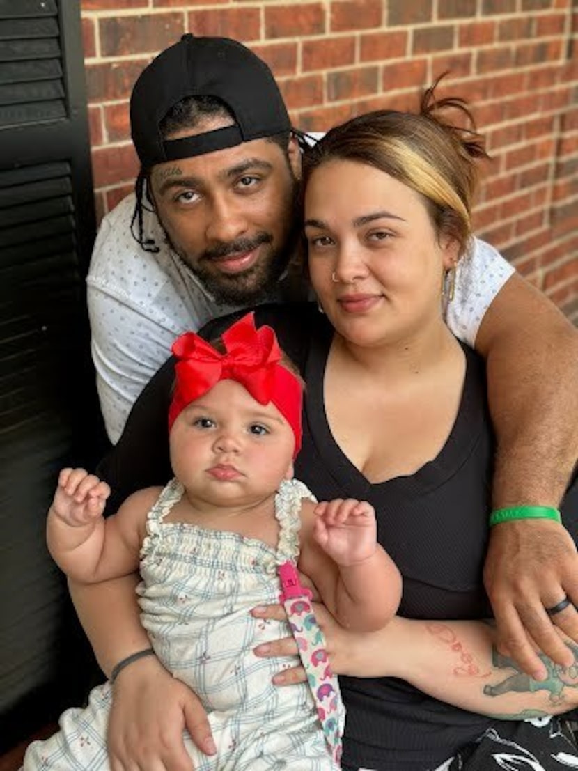 Kaylee and Devin Hall with their daughter, Brielle.