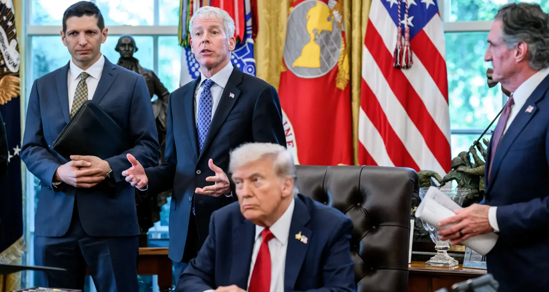 Chris Wright and Donald Trump, center