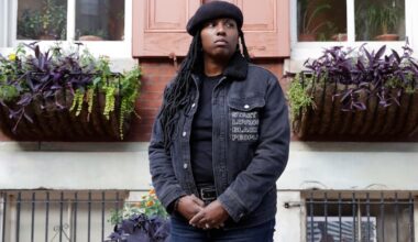 Philadelphia artist Mary Enoch Elizabeth Baxter stands in front of Thomas Eakins' Spring Garden neighborhood house on Monday, October 18, 2021.
