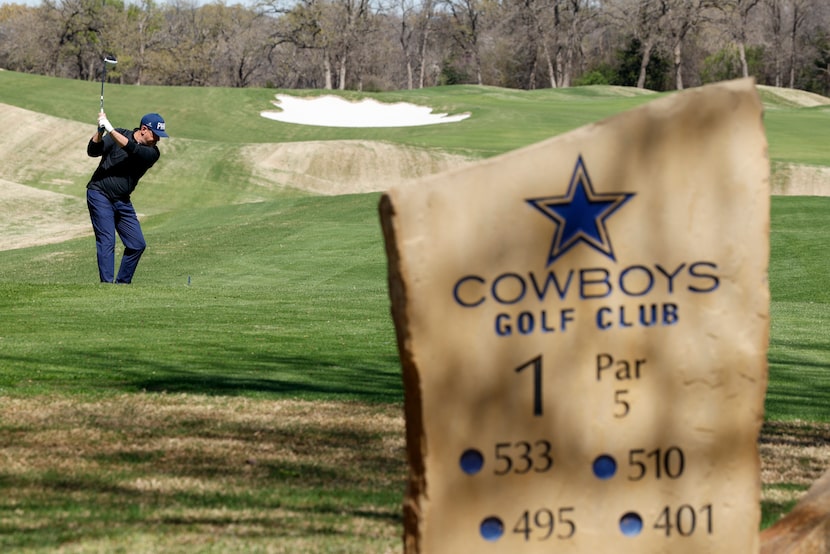 Ivan Gutierrez of Flower Mound hits from the 1st tee at Cowboys Golf Club. Green fees —...