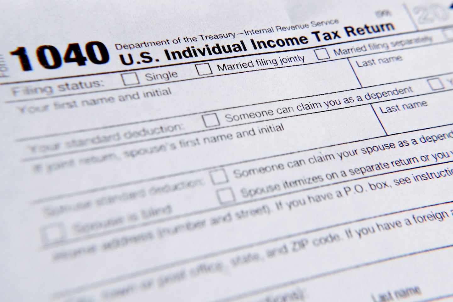 A 1040 tax form printed from the Internal Revenue Service web page is seen, Feb. 13, 2019, in Zelienople, Pa.