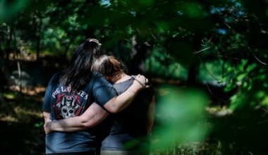 Lisa Thornton, right, embraces her daughter. Thornton and her daughter moved from Florida to Massachusetts in December to seek gender-affirming care after restrictions were imposed in their home state.