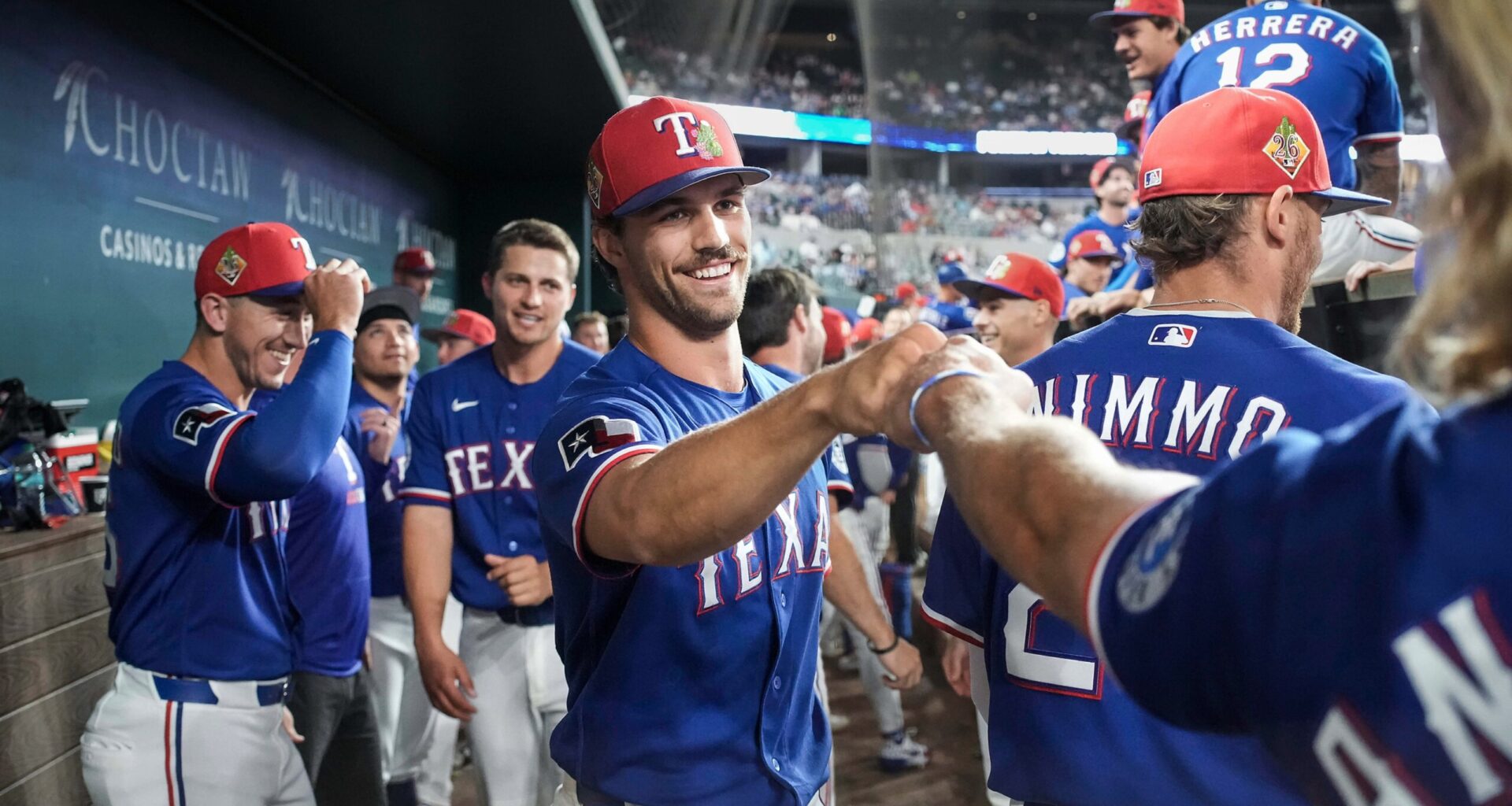 Rangers rookie pitcher finds out he made the team during a mound visit from manager