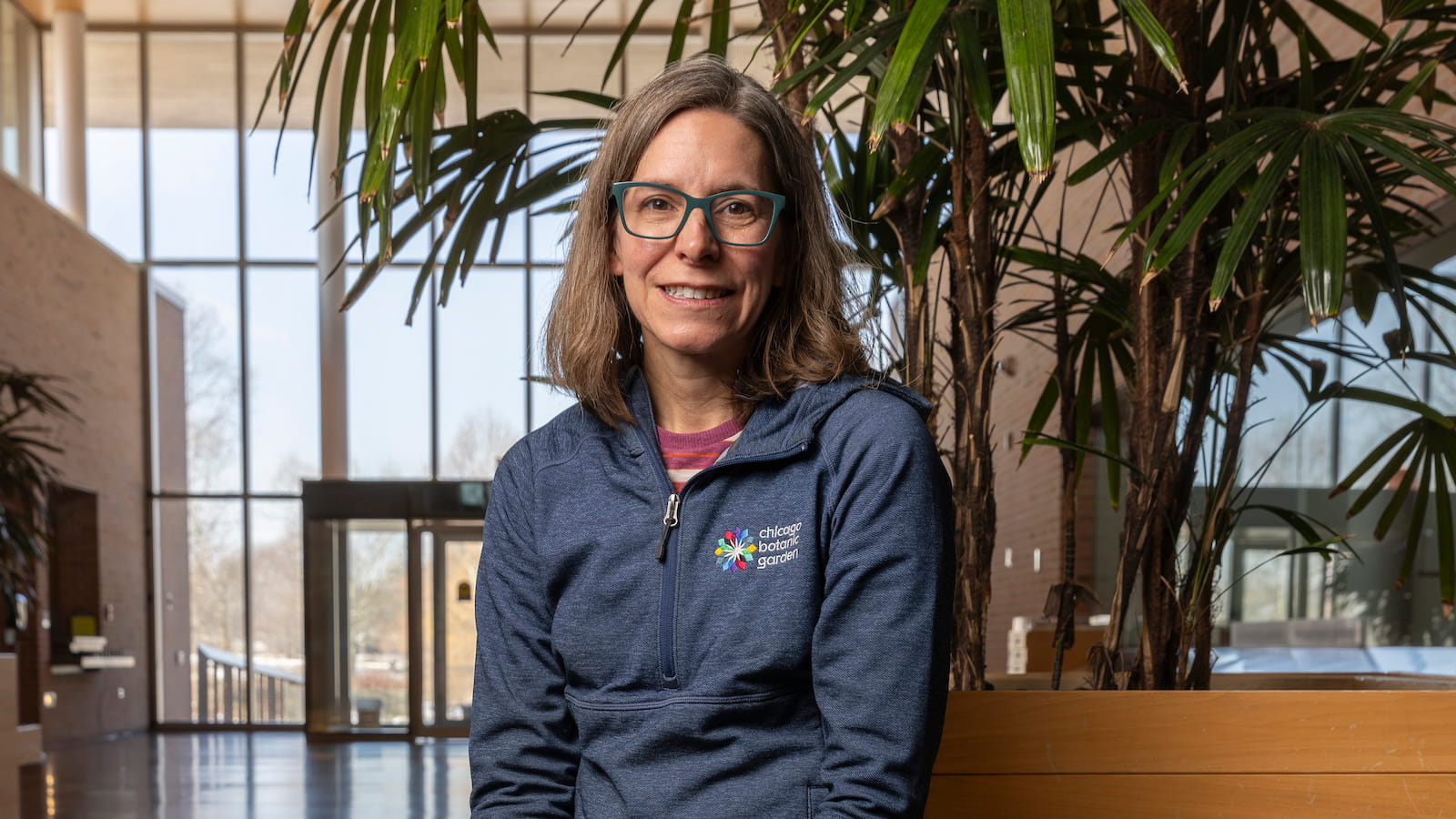 Scientist seated inside Chicago Botanic Garden's science center