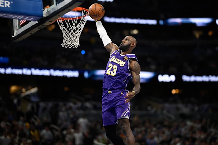 LeBron James breaks NBA mark for games played, Luke Kennard makes winning 3 in Lakers' win vs. Magic