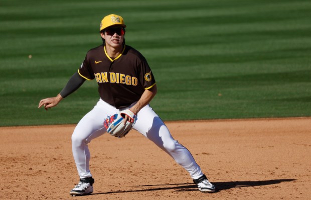 Peoria, AZ - February 22: Sung-Mun Song #24 of the San Diego Padres plays third base against the Los Angeles Dodgers during a spring training game on February 22, 2026 in Peoria, AZ.  (K.C. Alfred / The San Diego Union-Tribune)