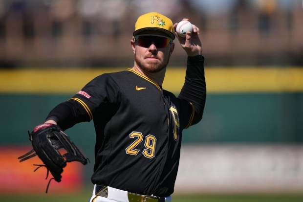 Pittsburgh Pirates' Ryan O'Hearn warms up during a spring training baseball game, Monday, Feb. 23, 2026, in Bradenton. (AP Photo/Matt Slocum)