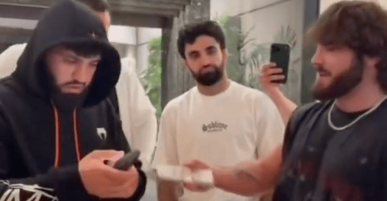 Georgio Poullas pays off $10,000 bet to Arman Tsarukyan, who plans to donate it to child in need