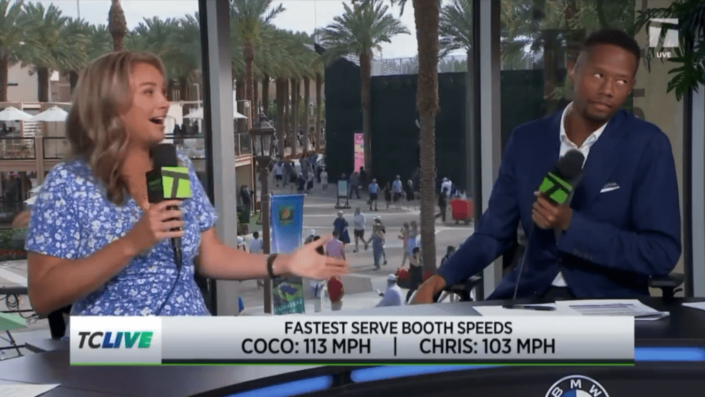 Two commentators in front of a window overlooking a promenade, with a graphic displaying "Fastest Serve Booth Speeds: Coco: 113 MPH | Chris: 103 MPH".