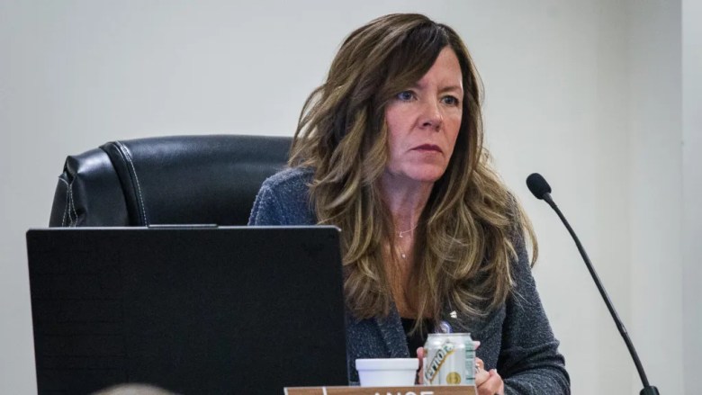 St. Clair County Commissioner Kerry Ange sits in a meeting.