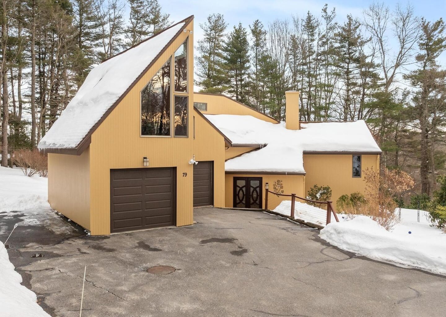 Something to treasure during a winter like this: Separate garages for two vehicles.