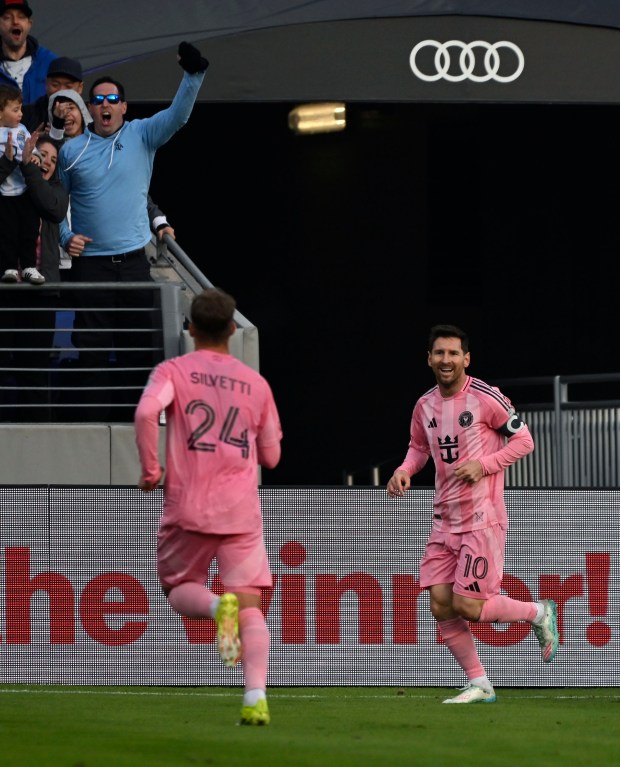Inter Miami CF's Lionel Messi, right, looks to teammate Mateo Silvetti, left, to celebrate after scoring against DC United in the first half of soccer match at M&T Bank Stadium. (Kenneth K. Lam/Staff)