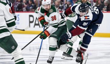Nazem Kadri just made Avs star Nathan MacKinnon smile like it's 2022