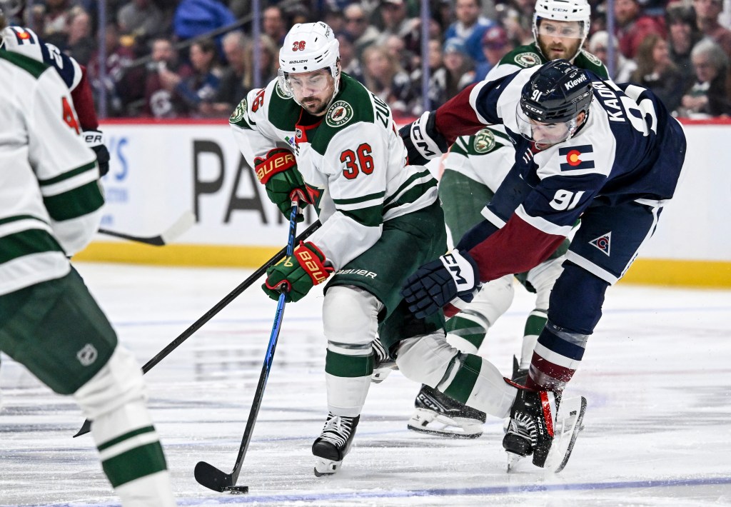 Nazem Kadri just made Avs star Nathan MacKinnon smile like it's 2022