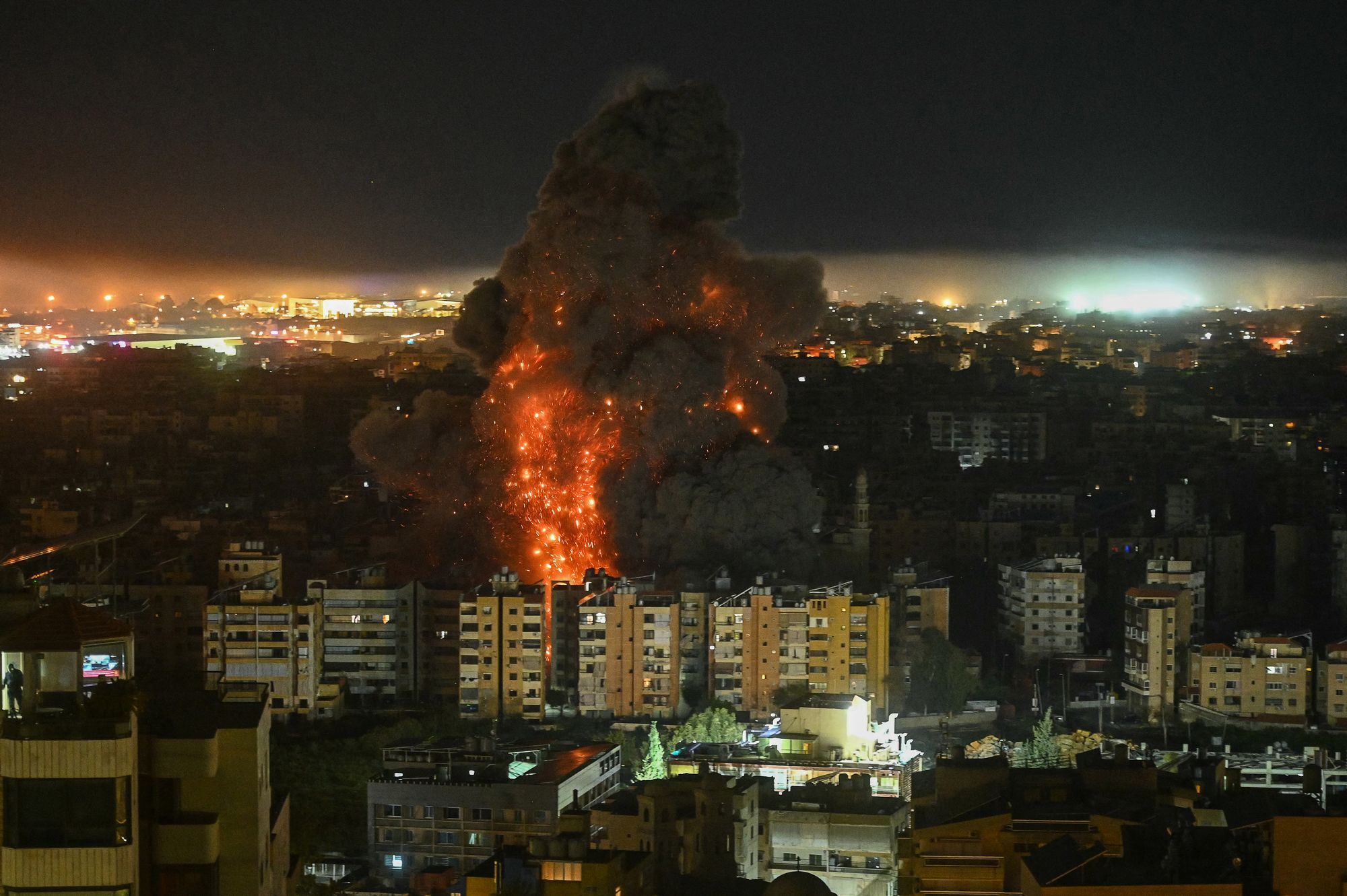 A fireball rises from the site of an Israeli airstrike that targeted an area in Beirut's southern suburbs overnight