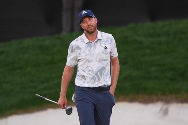 Daniel Berger reacts after his hit on the 18th hole during his playoff loss to Akshay Bhatia at the Arnold Palmer Invitational Sunday at Orlando's Bay Hill Club & Lodge. (AP Photo/Matt Slocum)