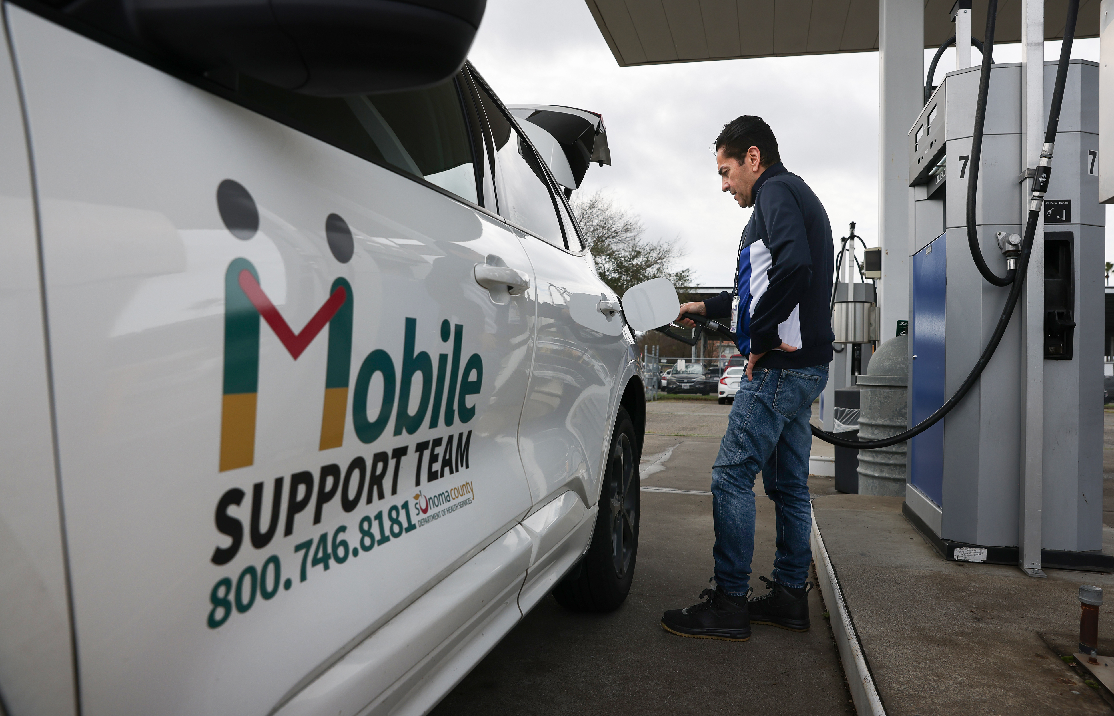 AODS counselor Steven MacDonald refuels a Sonoma County Mobile Health...