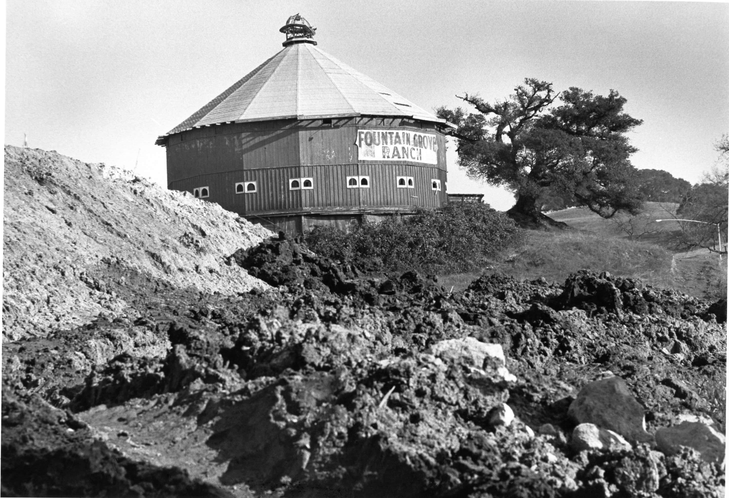 Grading work is being done in the foreground near the...
