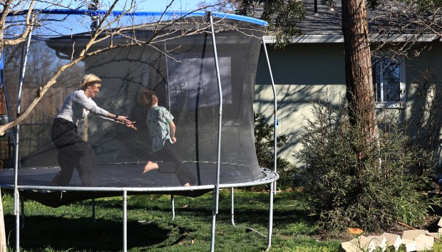 Cassandra Hulbert and son Jasper use their time together for exercise and bonding, Wednesday, Feb. 3, 2026, in Clearlake. (Kent Porter / The Press Democrat)