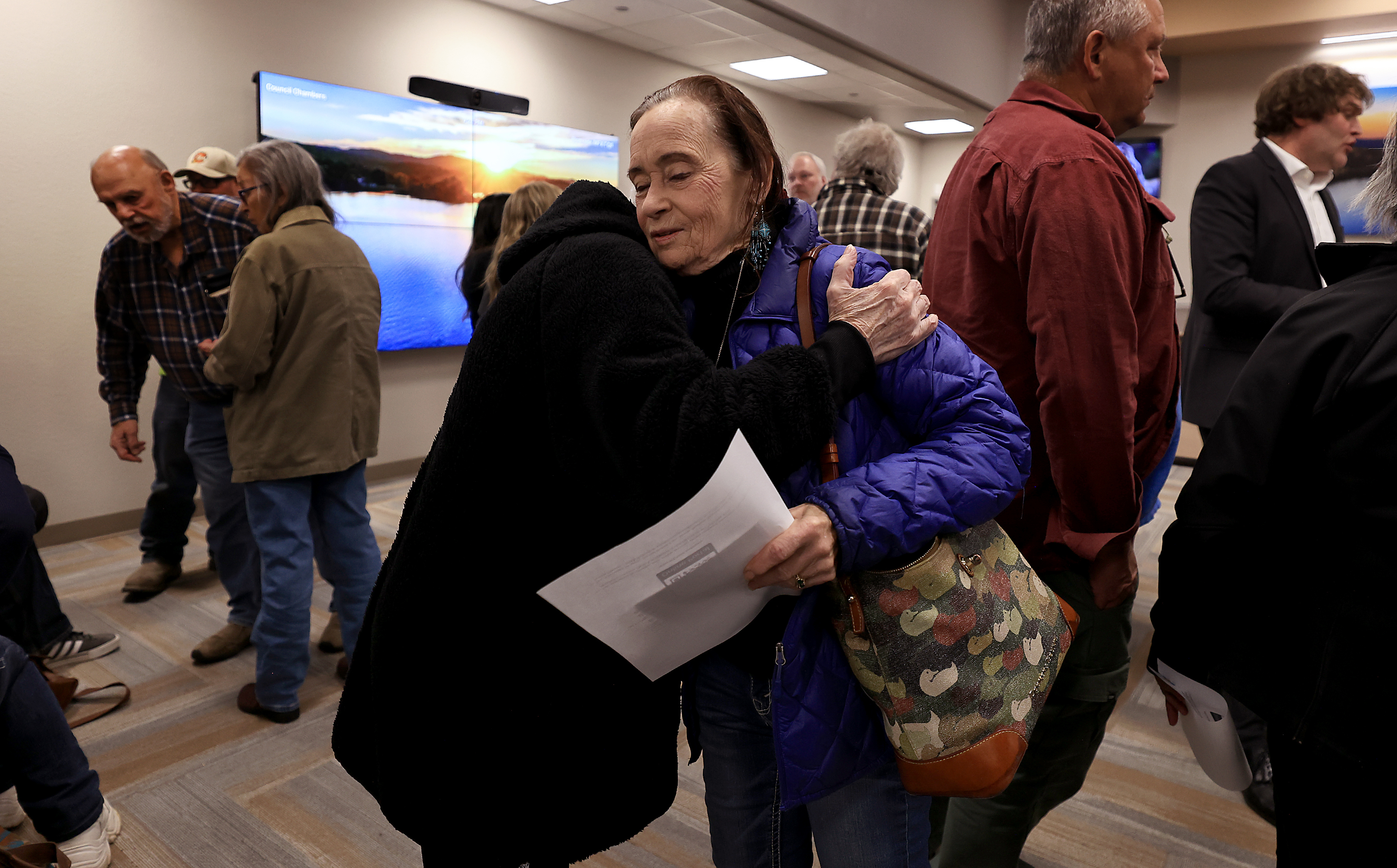 Prior to a community meeting, Wednesday, Feb. 4, 2026, Suzanne...