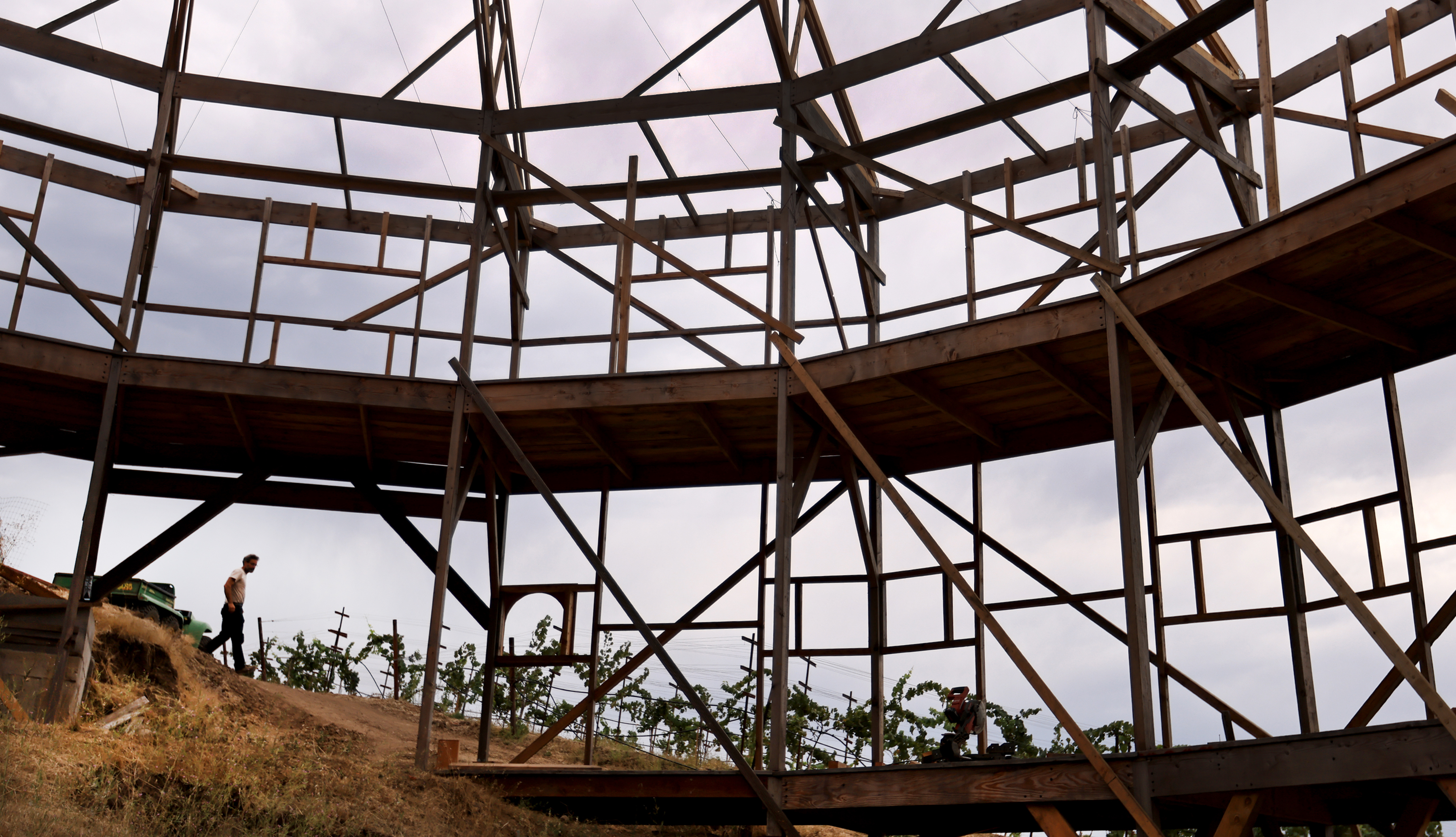 With painstaking conviction, Ken Moholt-Siebert, walks the perimeter of a...